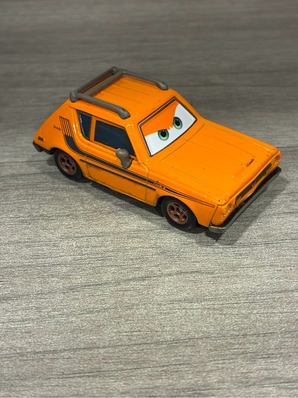 Disney Pixar Cars 2 Orange Lemon Car Grem Diecast 1:55 FC Villain